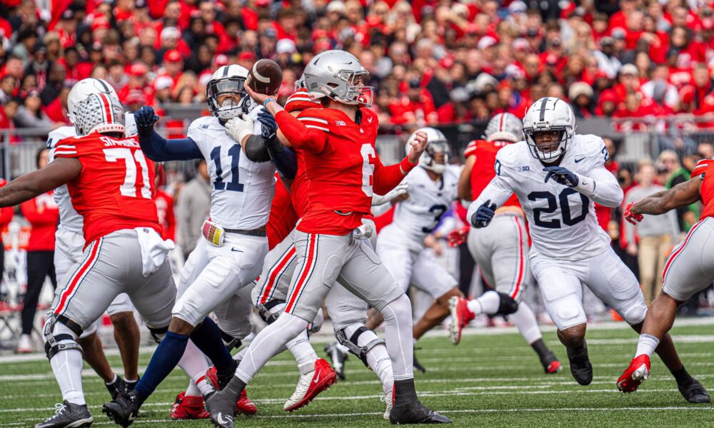 Ohio State's Kyle McCord passes the football before Penn State's Abdul Carter and Adisa Isaac can get pressure. (Photo by Matt Lynch, Nittany Sports Now)