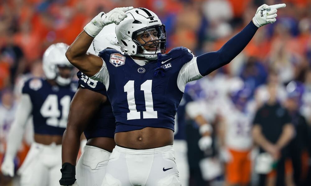 GLENDALE, AZ - DECEMBER 31: Defensive End Abdul Carter #11 of the Penn State Nittany Lions reacts after a big play during the Penn State Nittany Lions versus Boise State Broncos College Football Playoff Quarterfinal at the Vrbo Fiesta Bowl on December 31,2024, at State Farm Stadium in Glendale, AZ. (Photo by Kevin Abele/Icon Sportswire)