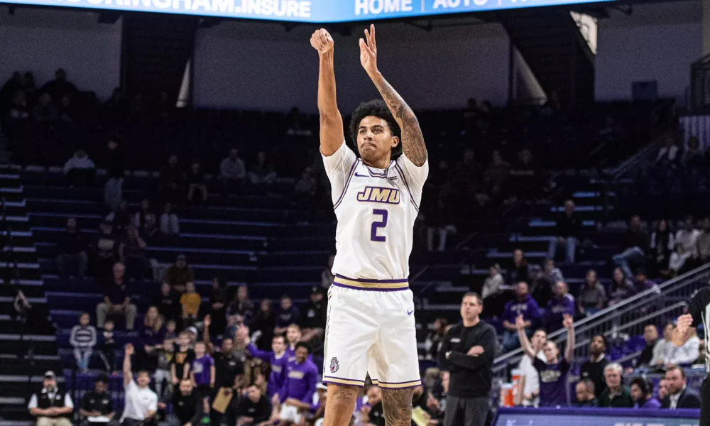 Former JMU point guard Bryce Lindsay follows through on a shot. Photo courtesy of JMU Athletics.