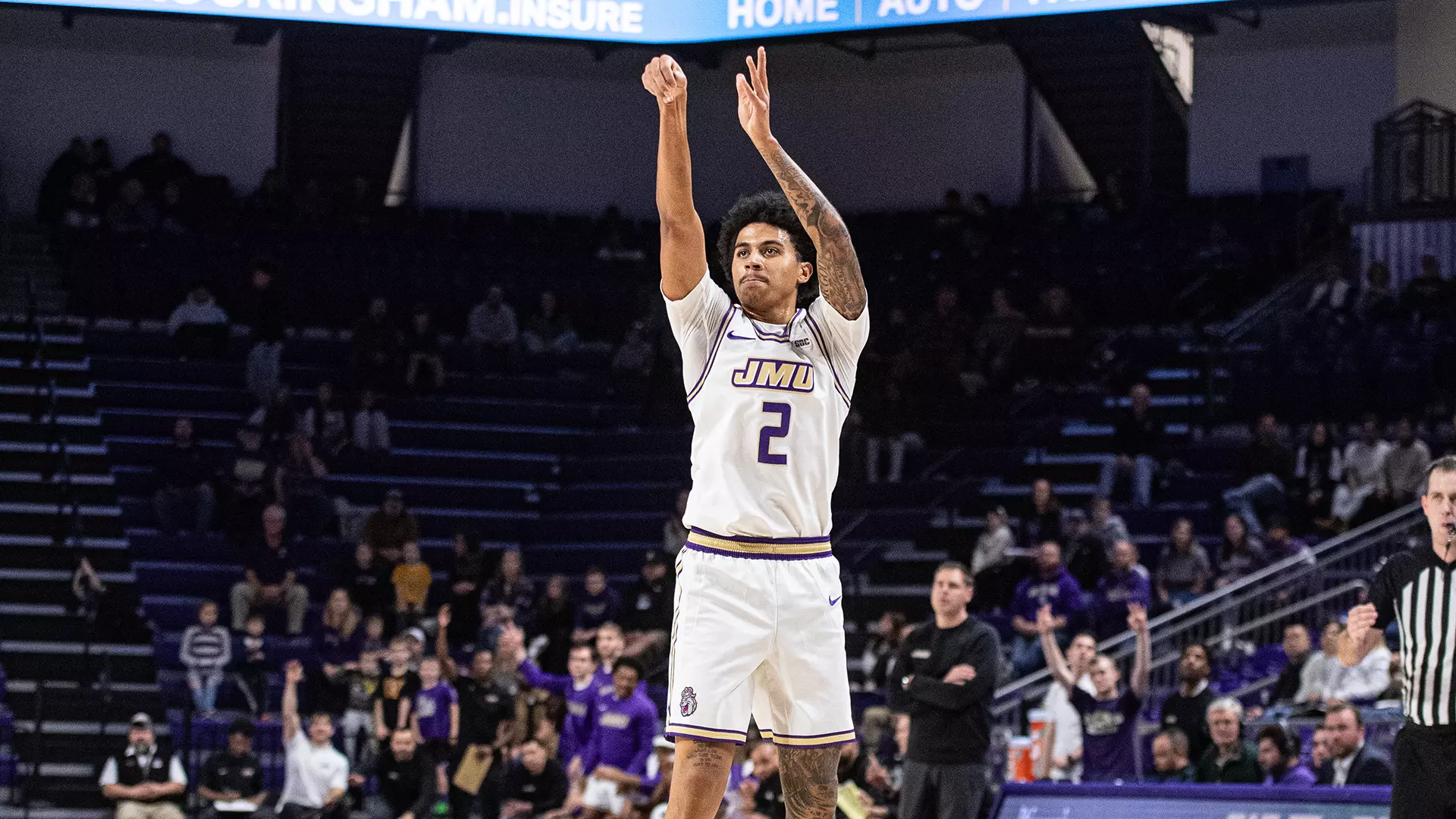 Former JMU point guard Bryce Lindsay follows through on a shot. Photo courtesy of JMU Athletics.