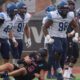 Villanova Football defensive tackle Obinna Nwobodo (98) flexes after a tackle. Image courtesy of Obinna Nwobodo's Instagram account.