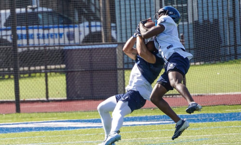Villanova Football cornerback Zahmir Dawud (2) fights for the ball in summer practices. Image courtesy of Nova Football Recruiting.