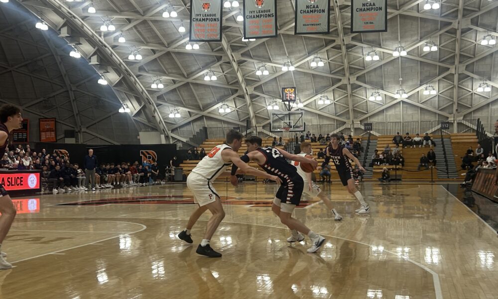 Penn guard Ethan Roberts dribbles toward the basket during the first half of the Quakers' Jan. 5, 2026 loss to the Princeton Tigers. Griffin Floyd/Philadelphia Sports Now.