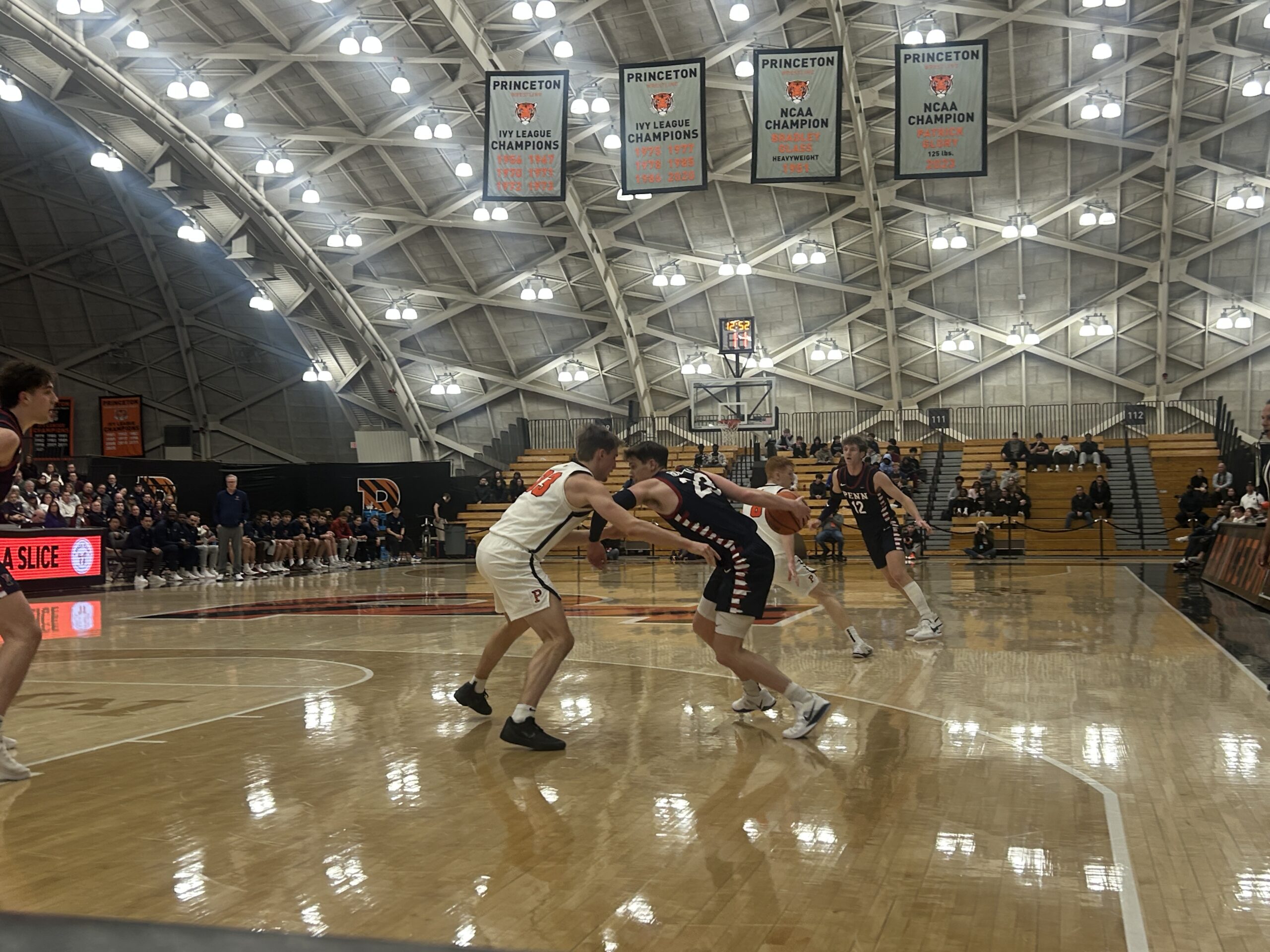 Penn guard Ethan Roberts dribbles toward the basket during the first half of the Quakers' Jan. 5, 2026 loss to the Princeton Tigers. Griffin Floyd/Philadelphia Sports Now.