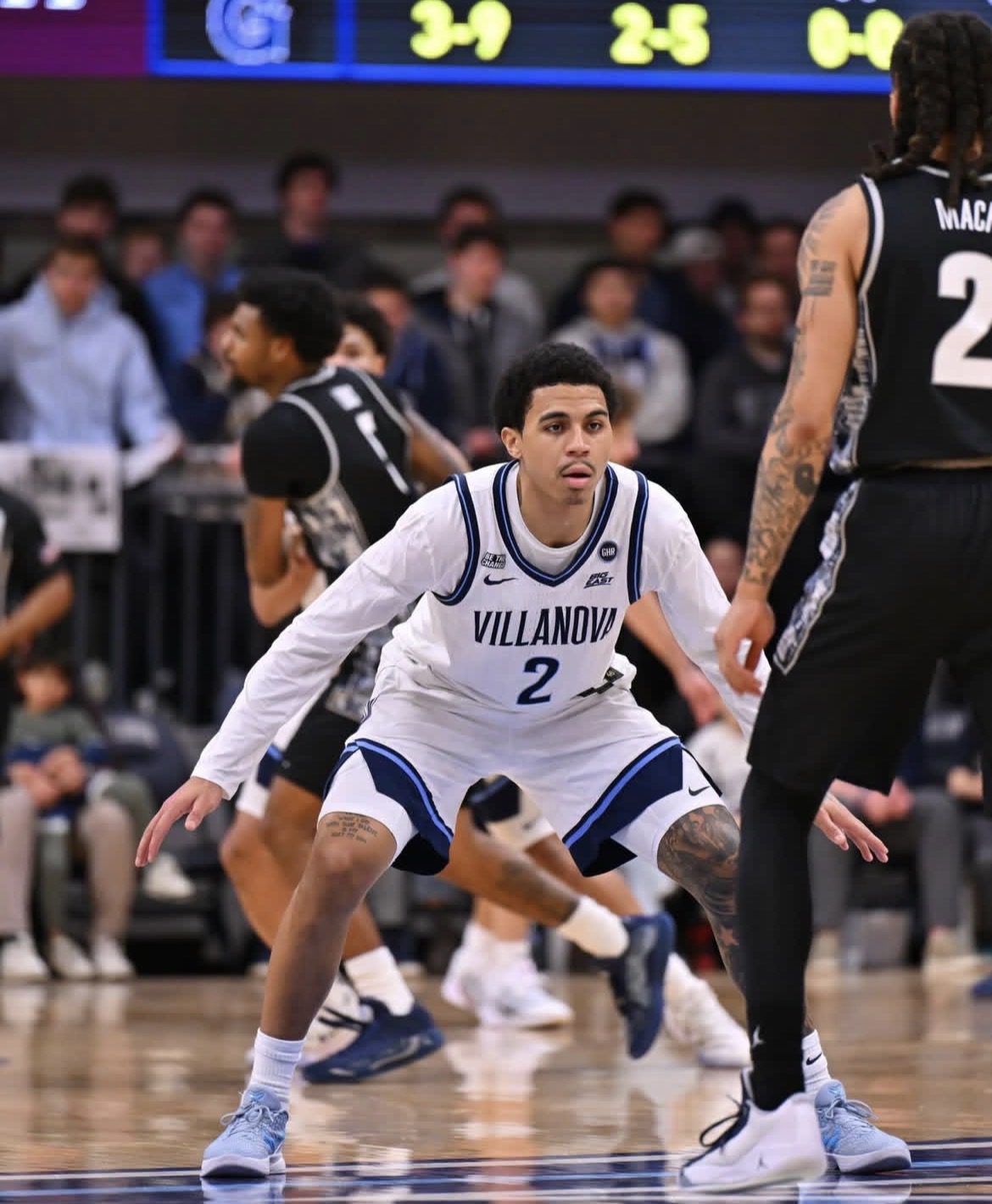 Villanova guard Bryce Lindsay squares up on defense. Image courtesy of Nova MBB's Instagram account.