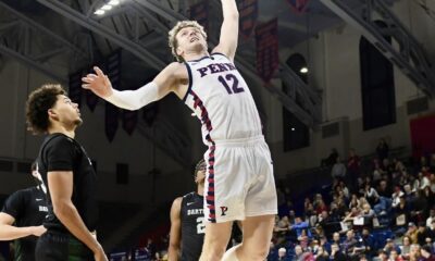 Penn Forward TJ Power catches air in the first half of the Quakers’ Feb. 27 win over Dartmouth. Image courtesy of Penn Men’s Basketball’s Instagram account.