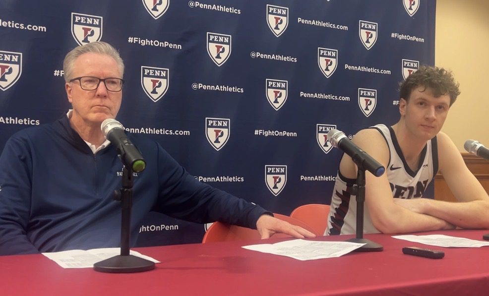 Left to right: Penn Men's Basketball head coach Fran McCaffery and junior forward TJ Power. Griffin Floyd/Philadelphia Sports Now