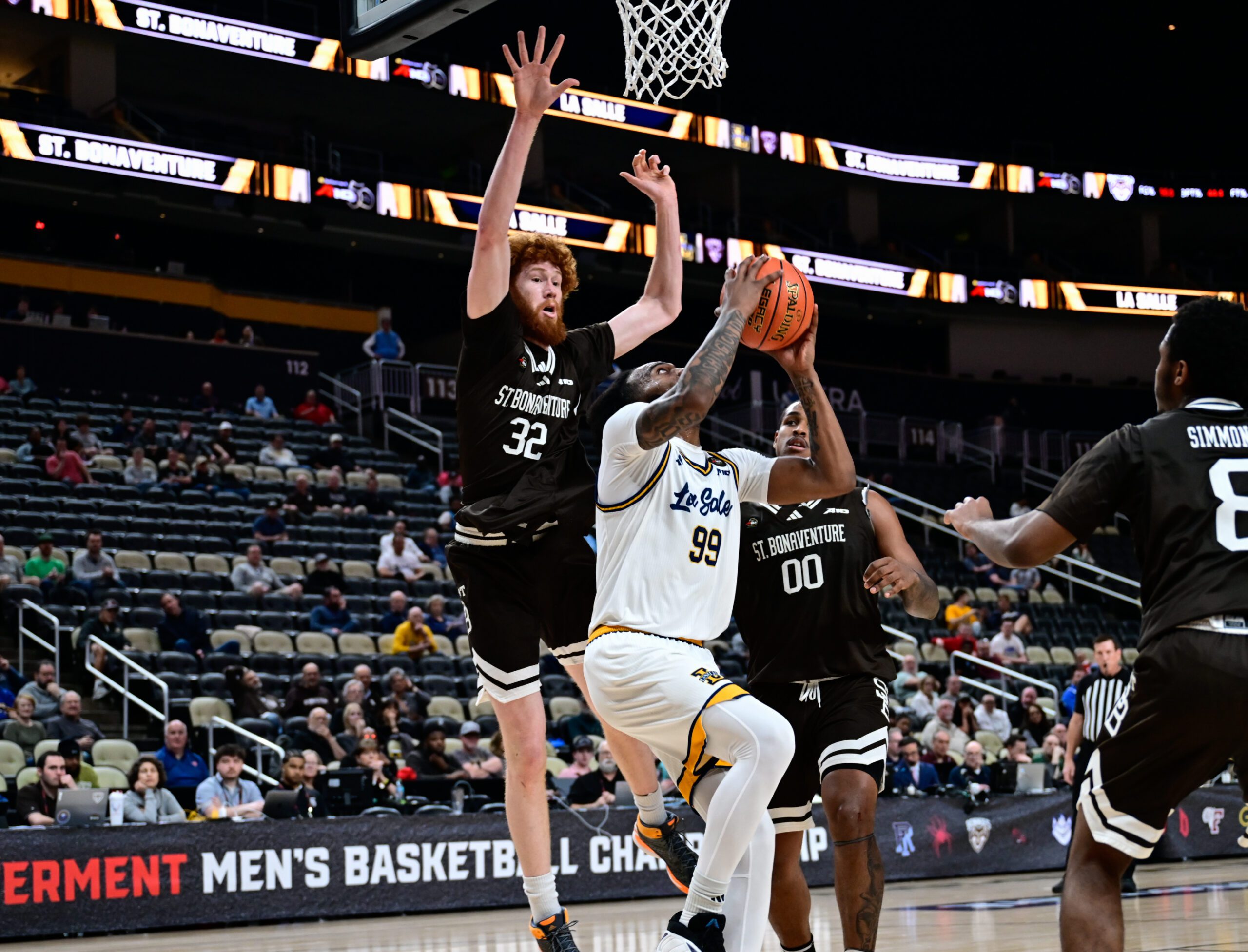 La Salle guard Rob Dockery (99) attempts a layup during the Explorers’ March 11 loss to St. Bonaventure in the A-10 Tournament. Ed Thompson/PSN
