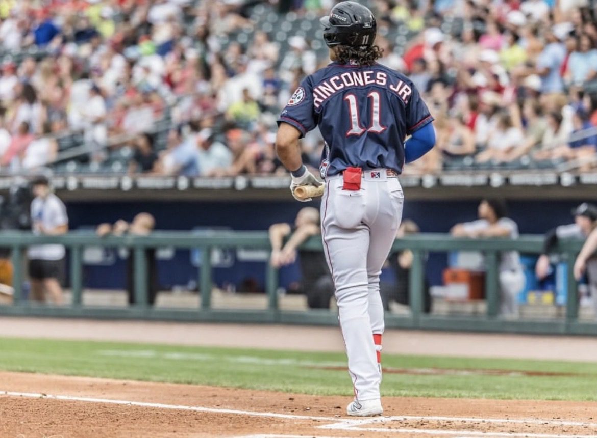 Phillies outfield prospect Gabriel Rincones Jr. concludes an at-bat for the Lehigh Valley Iron Pigs. Image courtesy of Gabriel Rincones Jr.'s Instagram account.