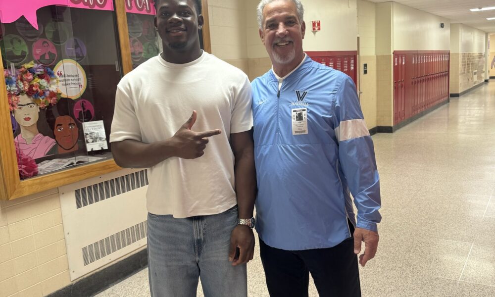 Villanova Football recruiting target Thomas Ajasin poses for a picture with head coach Mark Ferrante. Image courtesy of Thomas Ajasin's Twitter (X) account.