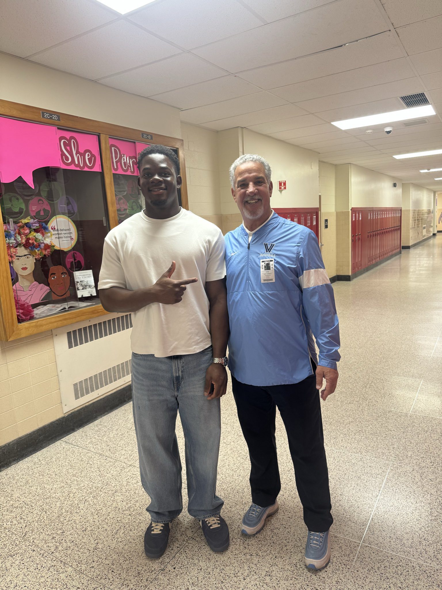 Villanova Football recruiting target Thomas Ajasin poses for a picture with head coach Mark Ferrante. Image courtesy of Thomas Ajasin's Twitter (X) account.