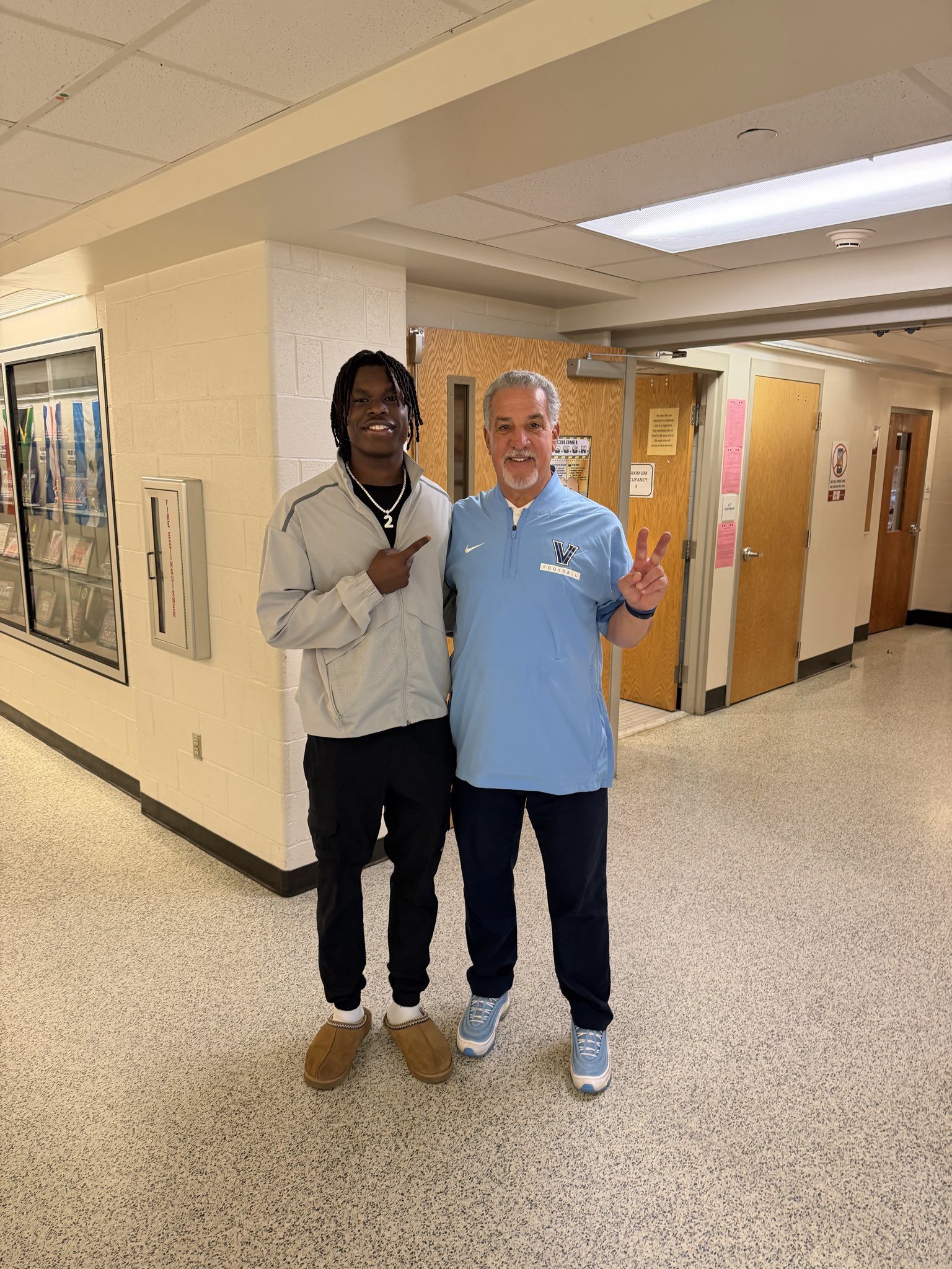 Villanova Football recruiting target Ja'Zir Dickerson poses for a picture with WIldcats' head coach Mark Ferrante. Image courtesy of Ja'Zir Dickerson's Twitter (X) account.