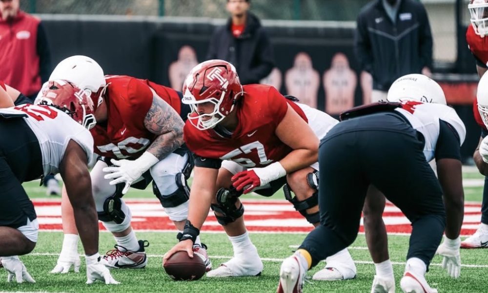 Temple Football center Grayson Mains prepares to snap the ball in practice. Image courtesy of Grayson Mains' Instagram account