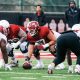 Temple Football center Grayson Mains prepares to snap the ball in practice. Image courtesy of Grayson Mains' Instagram account