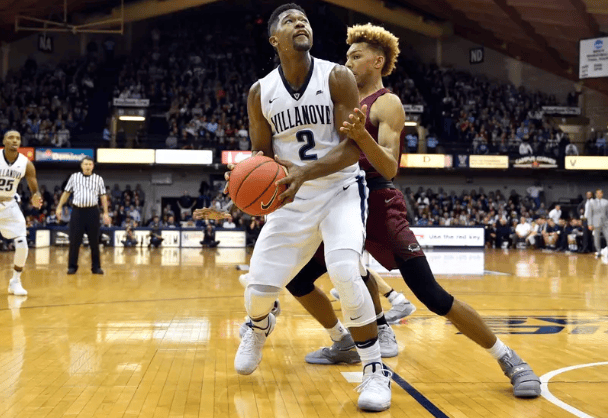Villanova legend Kris Jenkins prepares for a shot against Saint Joseph's during the 2016-17 season. Image courtesy of Villanova Athletics