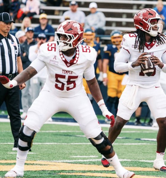 Temple Football offensive lineman Kevin Terry blocks for quarterback Ajani Sheppard. Image courtesy of Kevin Terry's Instagram account.