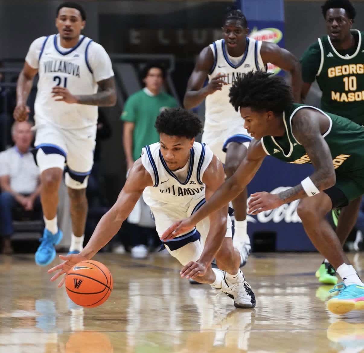 Villanova guard Tyler Perkins goes for the basketball. Image via Nova MBB's Instagram account